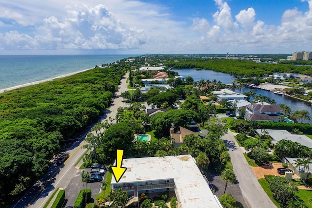 birds eye view of property featuring a water view