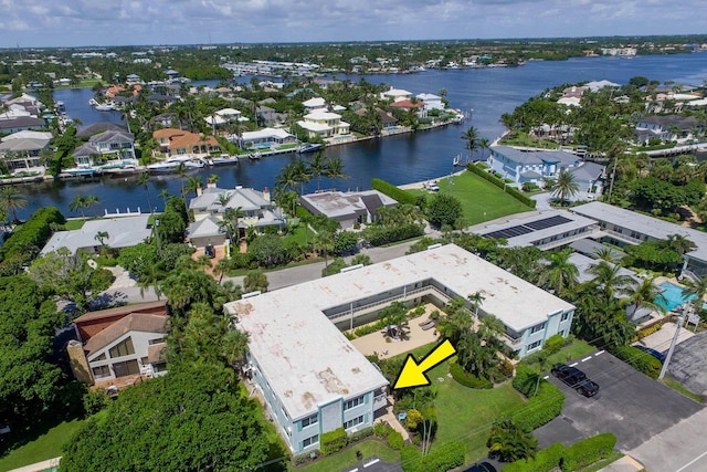 birds eye view of property featuring a residential view and a water view