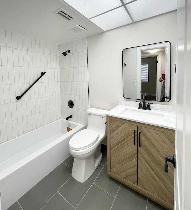 full bath featuring visible vents, toilet, tile patterned flooring, tub / shower combination, and vanity