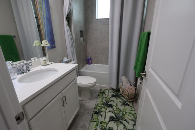 full bathroom featuring toilet, shower / tub combo with curtain, vanity, and tile patterned floors