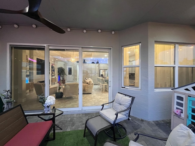 view of patio / terrace featuring ceiling fan