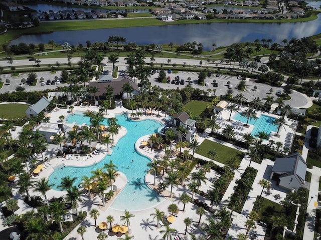 bird's eye view with a water view