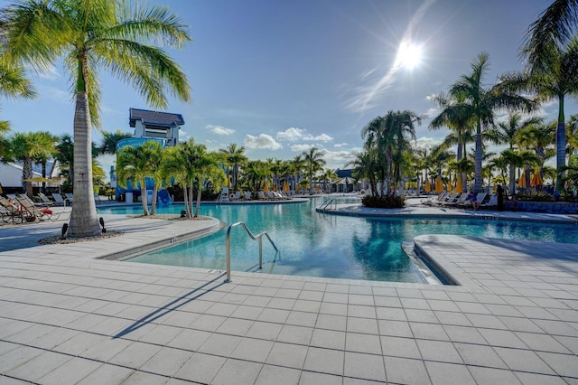 view of swimming pool with a patio area