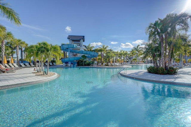 view of swimming pool featuring a water slide