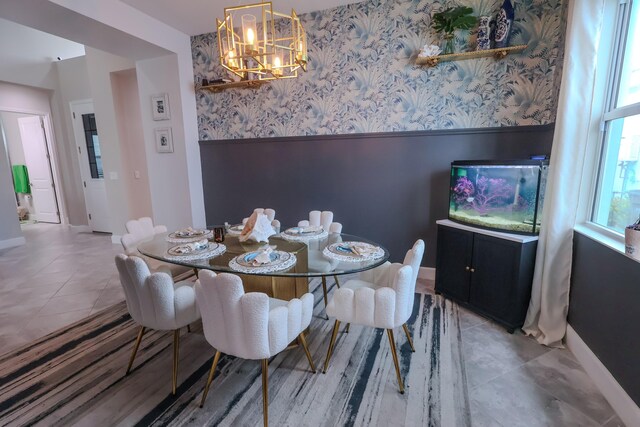 dining space featuring an inviting chandelier