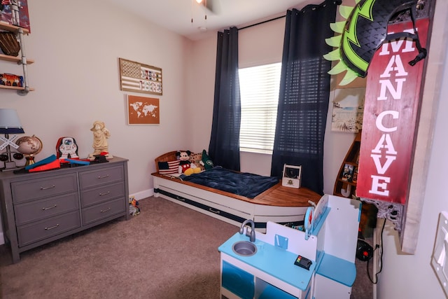 bedroom featuring light carpet