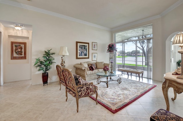 living room with crown molding and light tile patterned floors