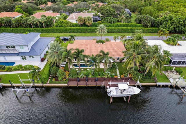 bird's eye view with a water view