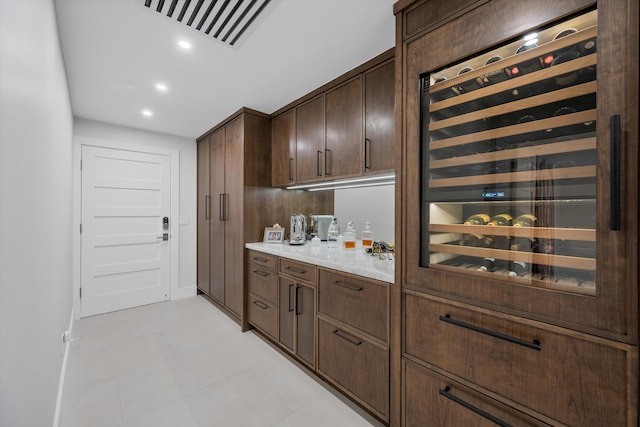 interior space with dark brown cabinets