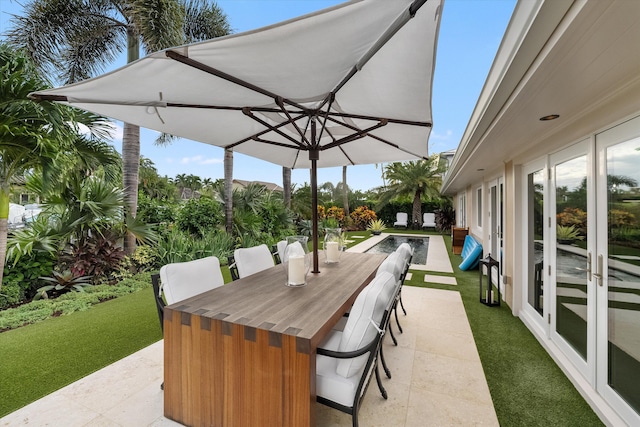 view of patio featuring french doors