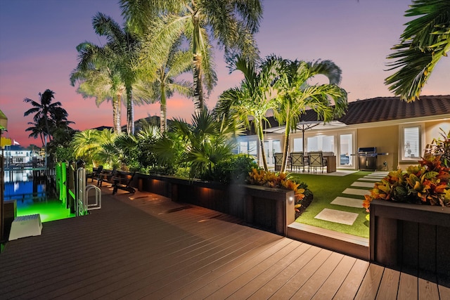 view of deck at dusk