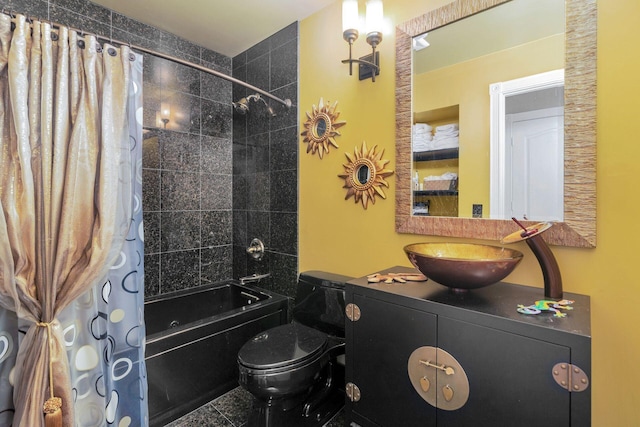 full bathroom featuring shower / bath combination with curtain, vanity, and toilet