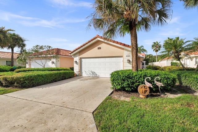 view of front of property with a garage