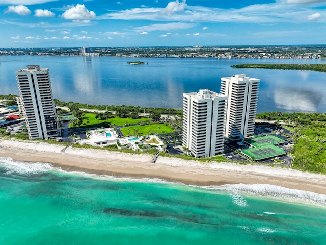 aerial view featuring a water view and a beach view