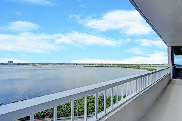 balcony featuring a water view