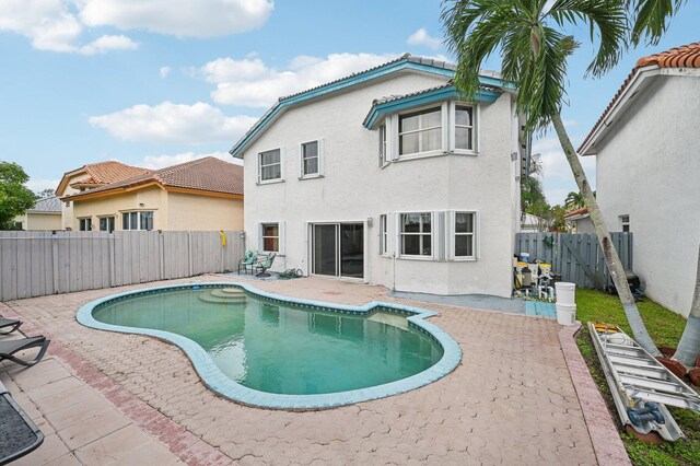 view of pool featuring a patio area