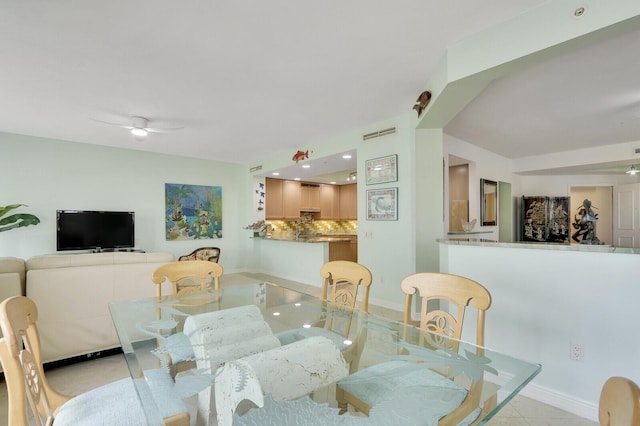 dining room featuring visible vents and light tile patterned floors