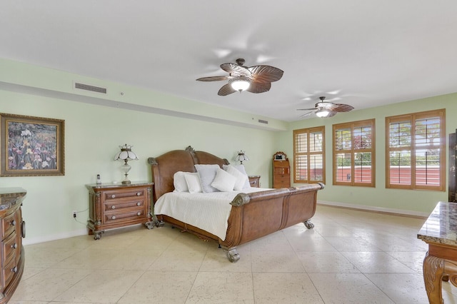 bedroom featuring visible vents, a ceiling fan, and baseboards