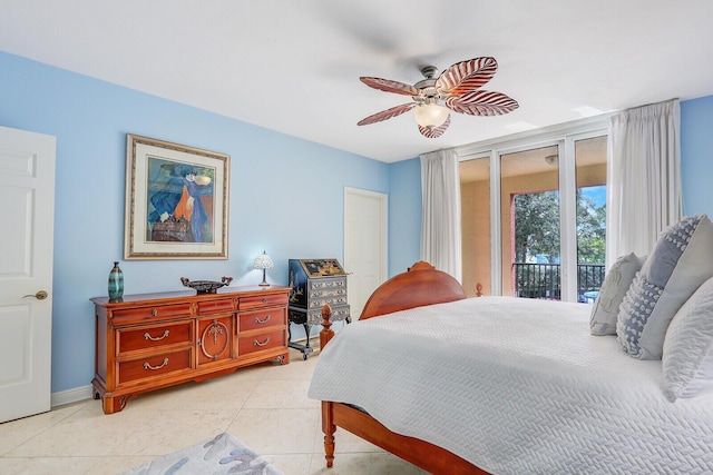 bedroom with light tile patterned flooring, baseboards, ceiling fan, and access to exterior