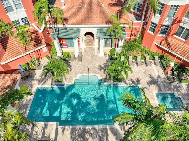 view of swimming pool featuring a patio area