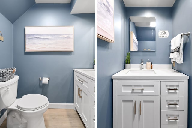 bathroom featuring lofted ceiling, vanity, toilet, and hardwood / wood-style flooring