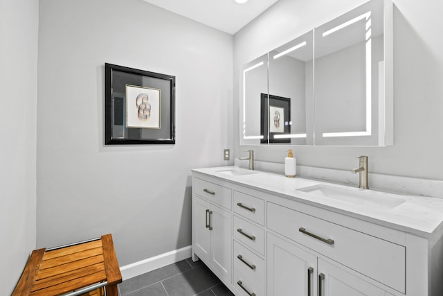 bathroom featuring vanity and tile patterned flooring