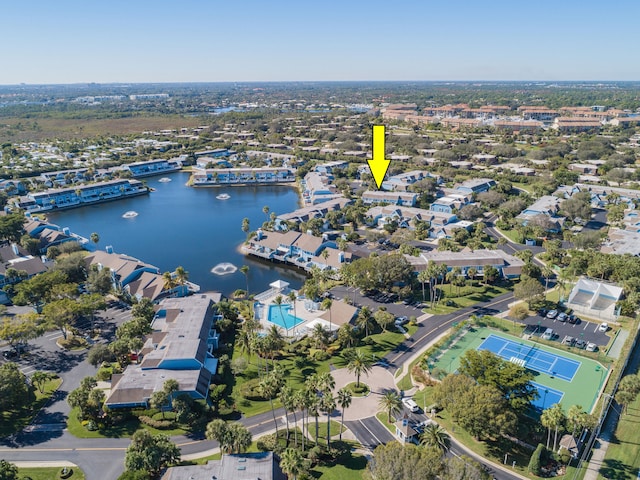 birds eye view of property featuring a water view