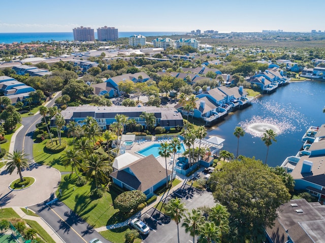 birds eye view of property featuring a water view