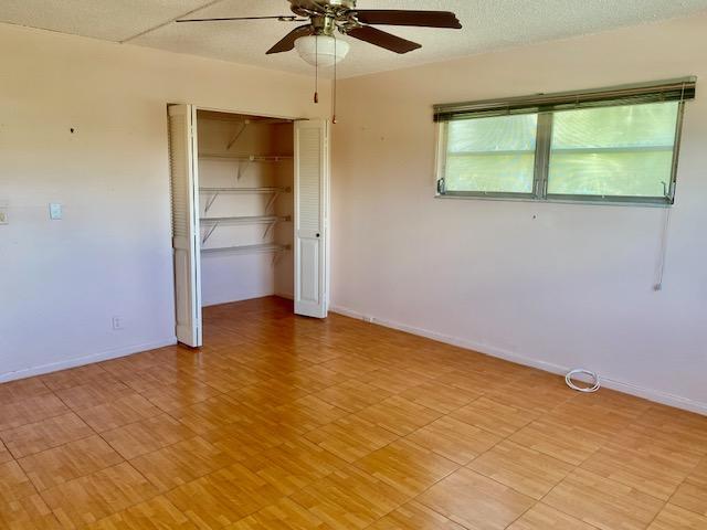 spare room featuring ceiling fan