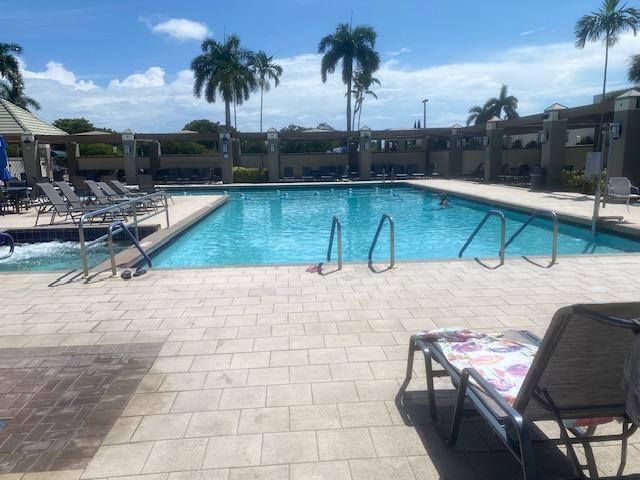 view of pool featuring a patio area