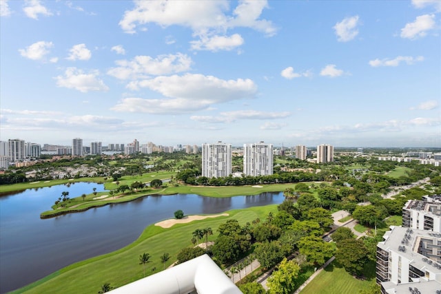 bird's eye view with a view of city, golf course view, and a water view