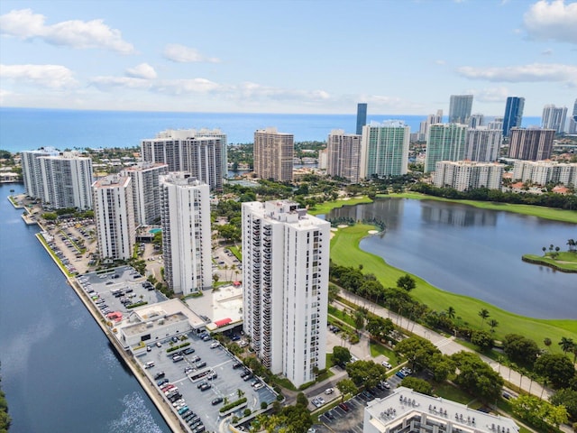 bird's eye view with a view of city and a water view