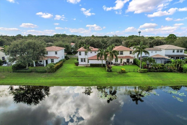 birds eye view of property featuring a water view