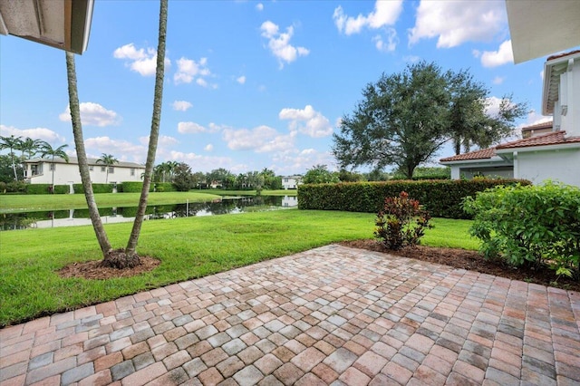 view of patio / terrace with a water view