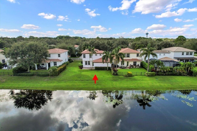 bird's eye view with a water view