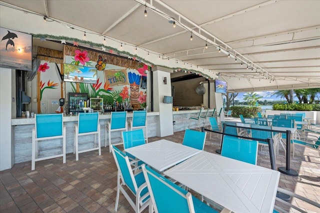 view of patio featuring exterior bar