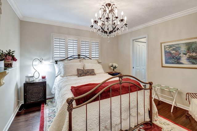 bedroom featuring hardwood / wood-style floors, ornamental molding, and a notable chandelier