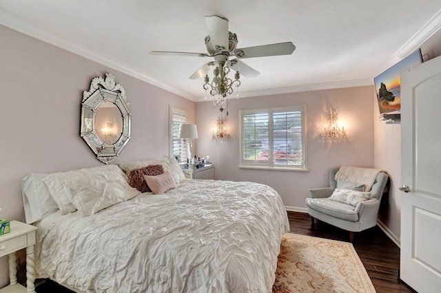 bedroom with dark hardwood / wood-style flooring, ceiling fan, and crown molding