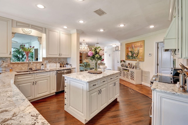 kitchen with dishwasher, dark hardwood / wood-style flooring, tasteful backsplash, and light stone countertops