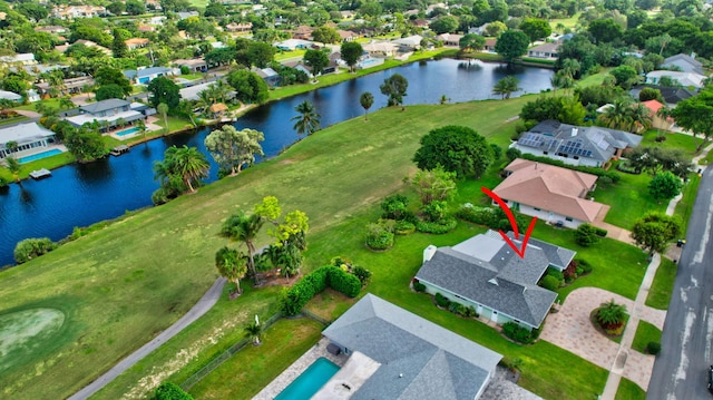 drone / aerial view with a water view