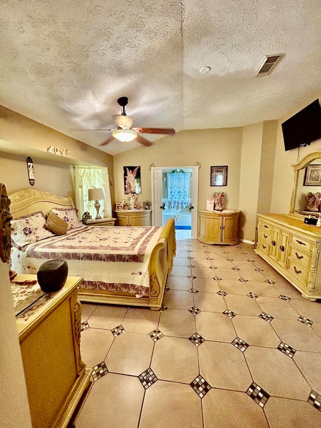 bedroom featuring a textured ceiling and ceiling fan