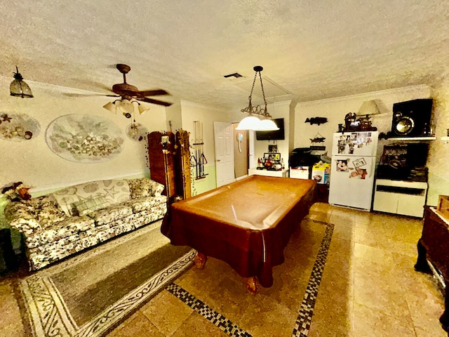 playroom featuring ceiling fan, ornamental molding, a textured ceiling, and billiards