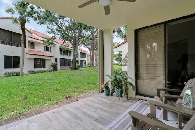 view of patio / terrace featuring ceiling fan