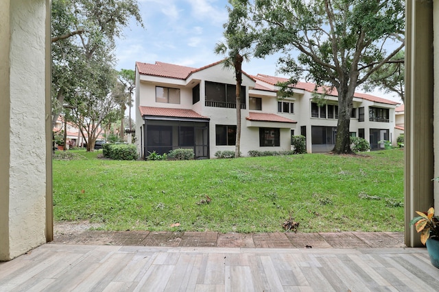 exterior space featuring a front lawn