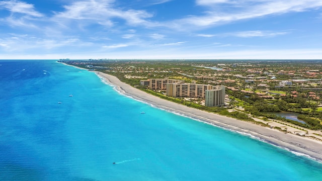 aerial view featuring a water view and a beach view