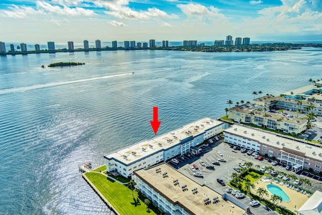 birds eye view of property featuring a water view