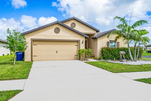 ranch-style house featuring a garage and a front lawn