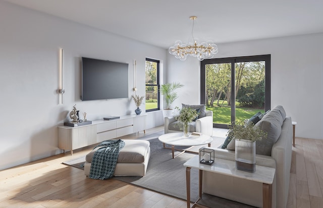 living room featuring light wood-type flooring and a notable chandelier