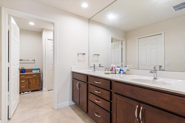 bathroom featuring vanity and tile patterned floors