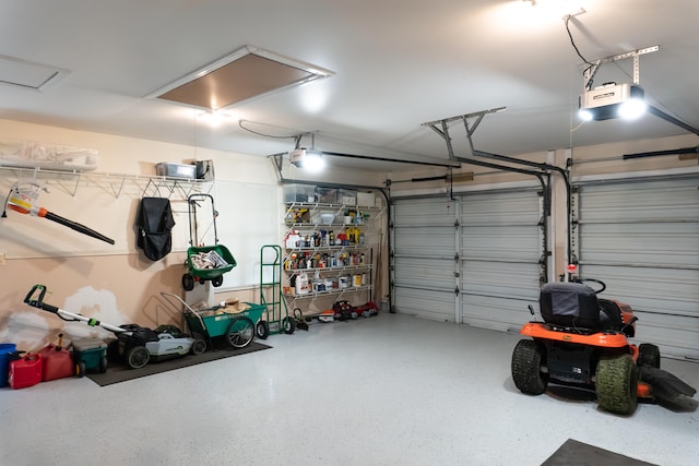 garage featuring a garage door opener